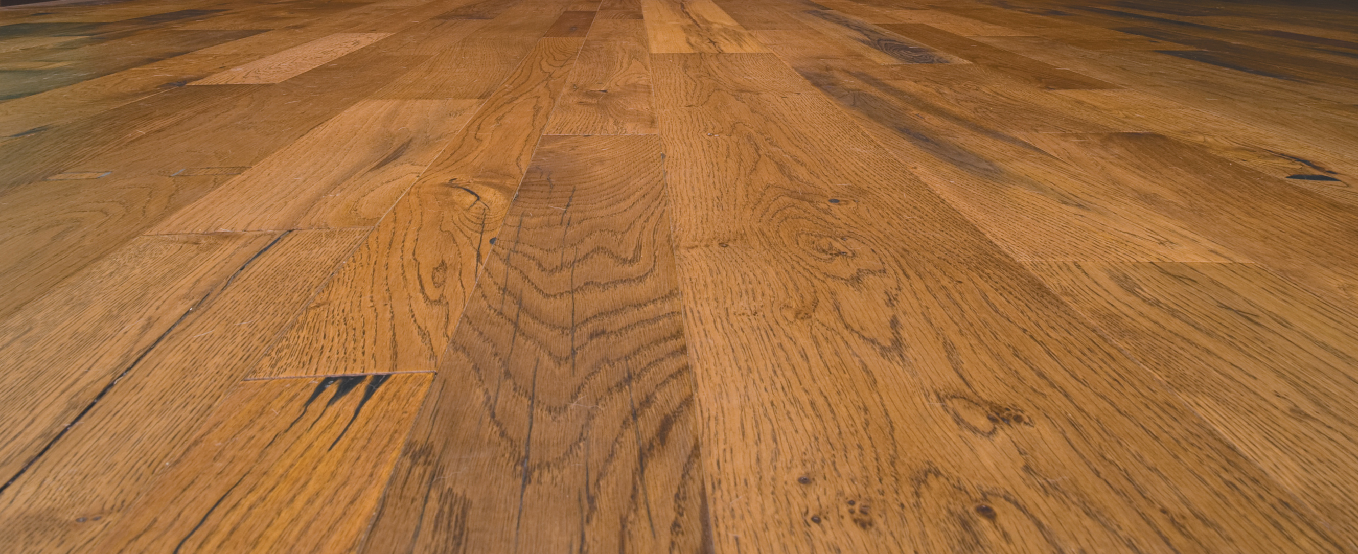 antique oak flooring with a rich patina from stout beer from the original Guinness brewery
